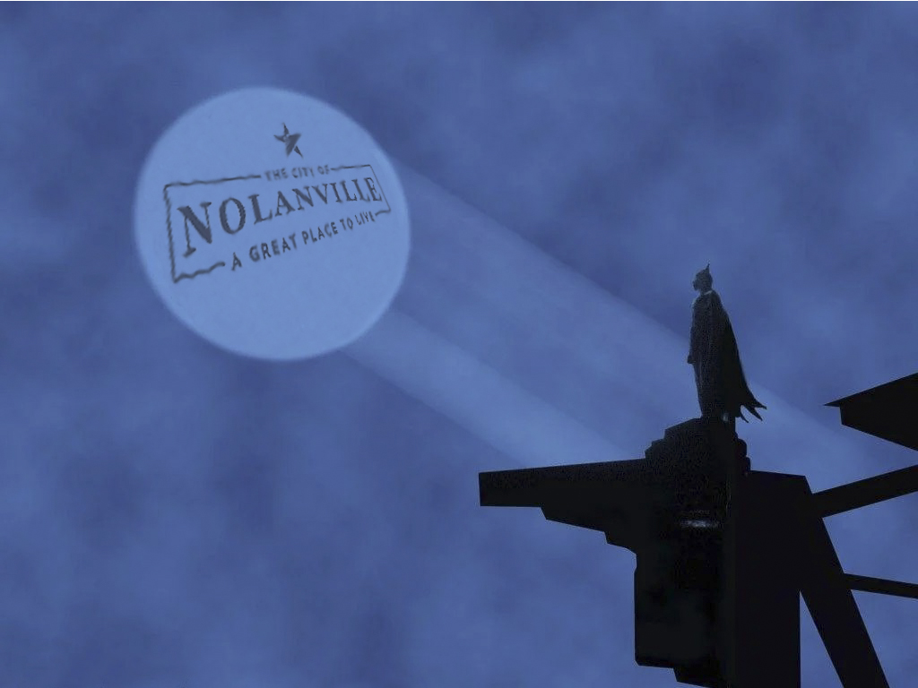 batman looks at Nolanville Bat Signal